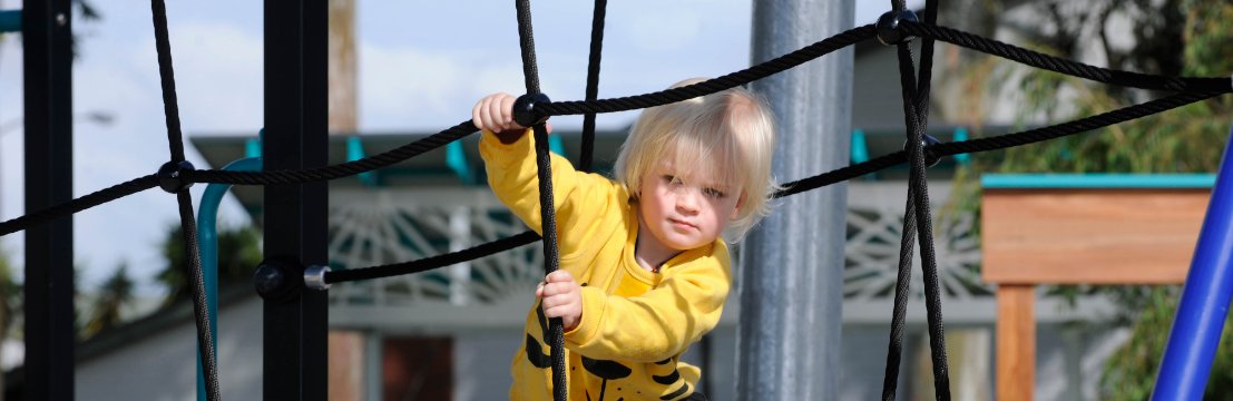 Image of child playing on climbing frame at Robinson Reserve